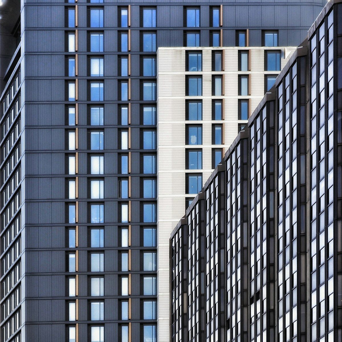 Photo by Richard Williams Modern buildings with geometric patterns and windows